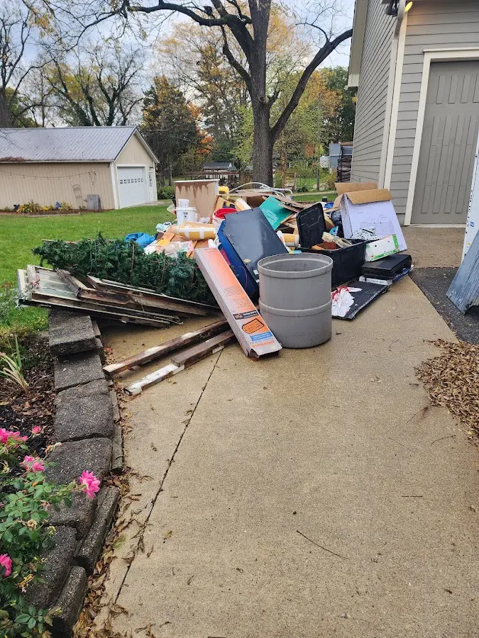 Dumpster being loaded with debris for 30 Yard Dumpster Rental in Berkshire Lakes